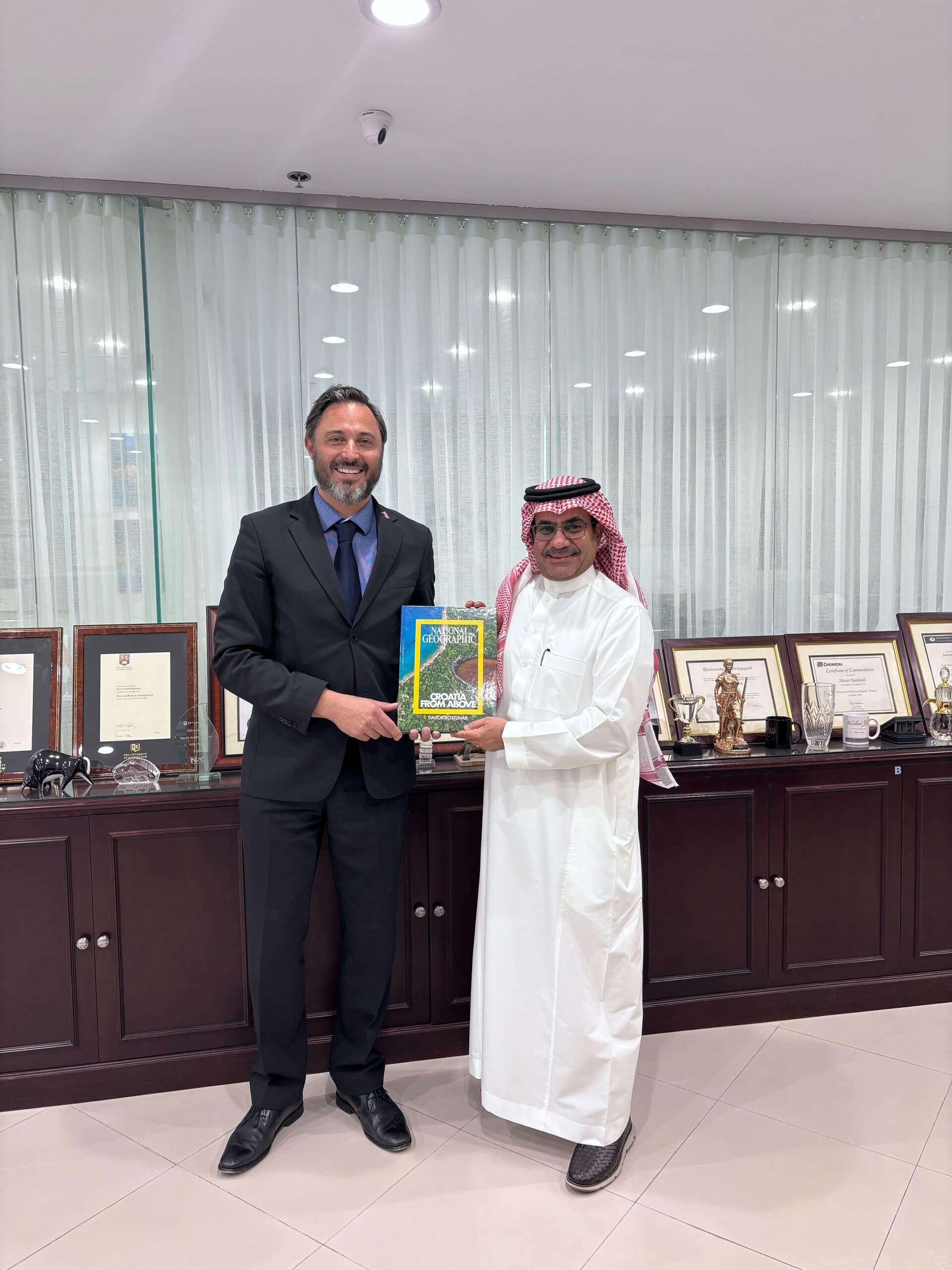 Mario Buljan giving Dr. Nasser a gift